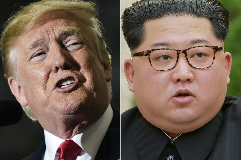 Donald Trump y Kim Jong-un / AFP