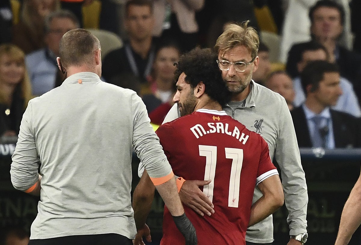 Jürgen Klopp y Mohamed Salah / AFP