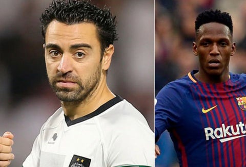 Xavi Hernández y Yerry Mina