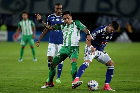 Dayro Moreno y Matías de los Santos en un duelo entre Nacional y Millonarios
