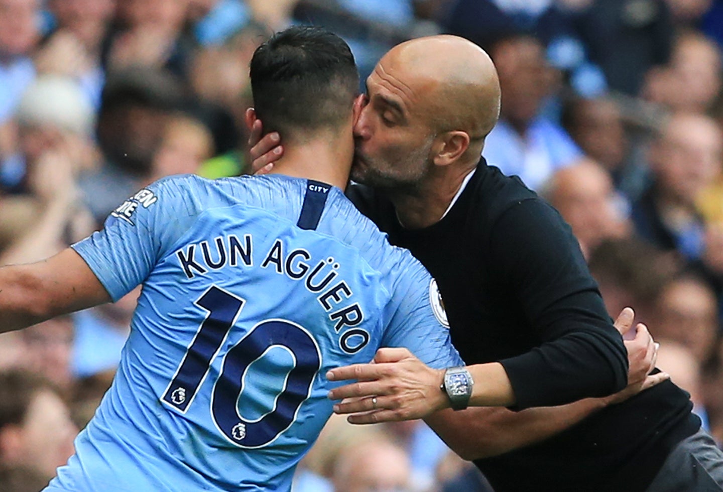 Sergio Agüero y Pep Guardiola