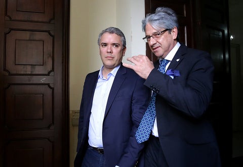 Iván Duque junto al consejero Jaime Amín.