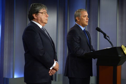 Presidente Iván Duque (der.) y el canciller Carlos Holmes Trujillo.