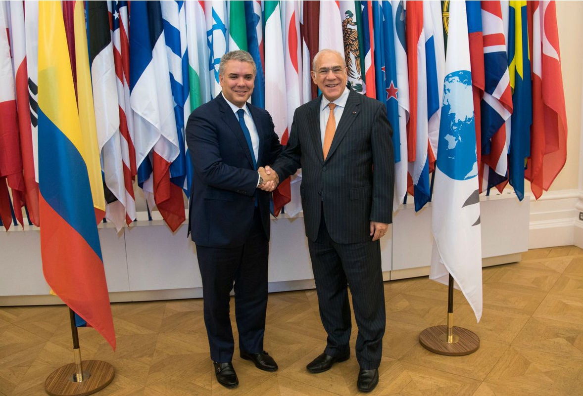 Iván Duque y José Ángel Gurría