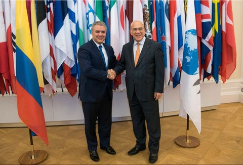 Iván Duque y José Ángel Gurría