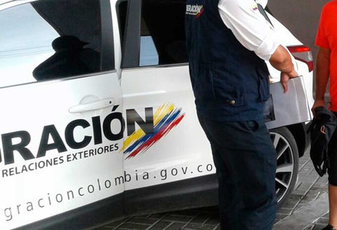 Funcionarios de Migración Colombia