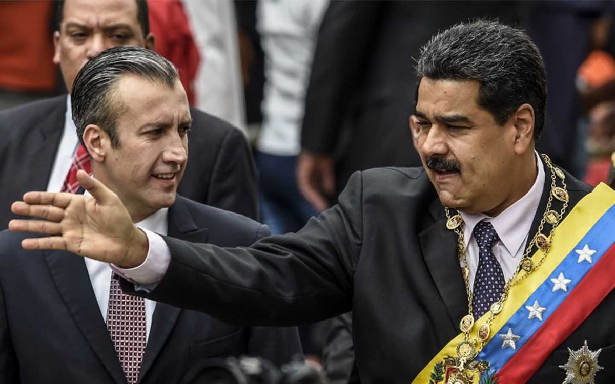 Tareck El Aissami y Nicolás Maduro
