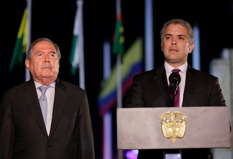 El ministro de Defensa, Guillermo Botero, junto al presidente Iván Duque