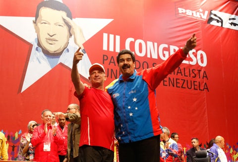 El exgeneral venezolano Hugo Carvajal junto al líder del régimen venezolano, Nicolás Maduro, el 27 de julio de 2014 en Caracas