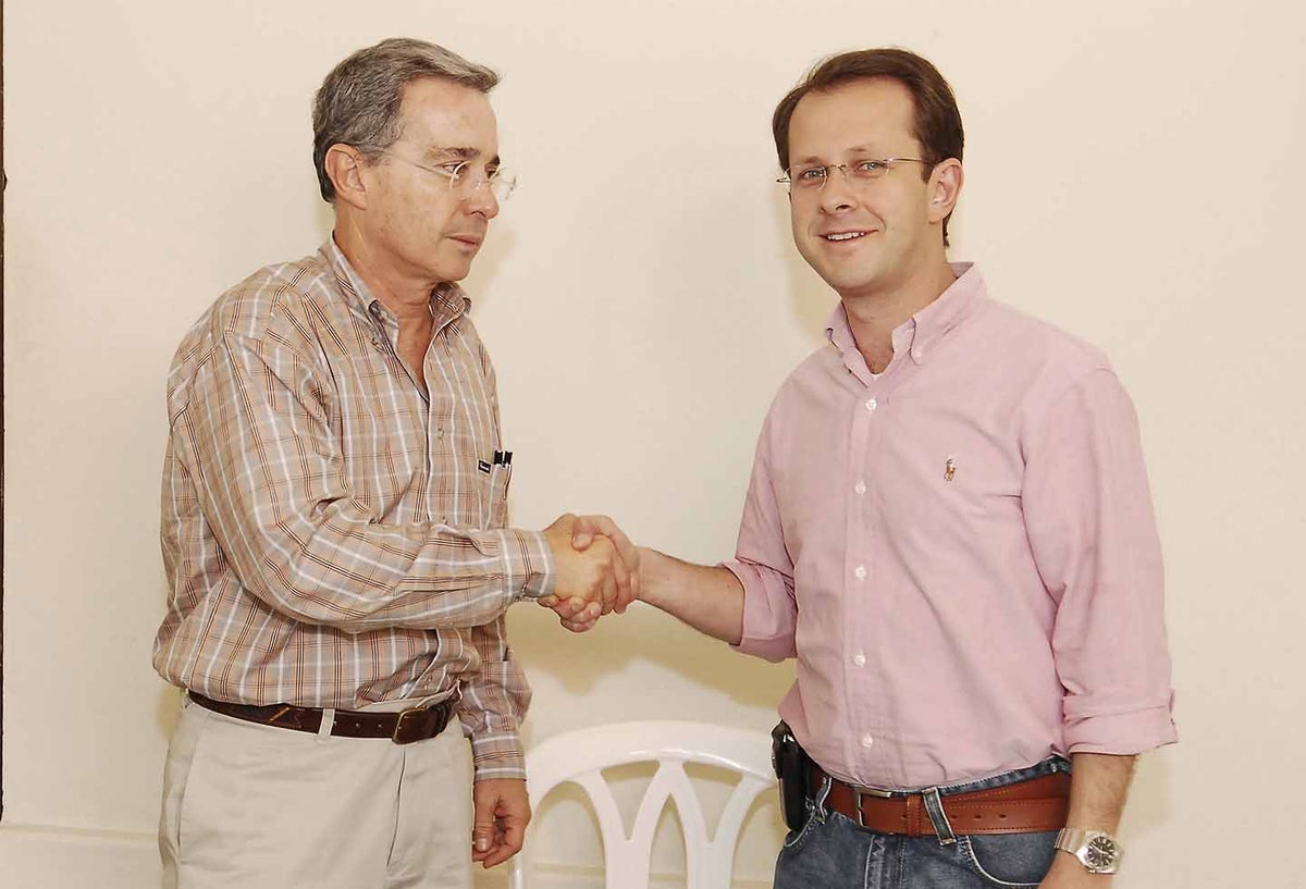 Álvaro Uribe y Andrés Felipe Arias.