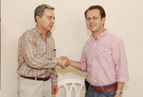 Álvaro Uribe y Andrés Felipe Arias.