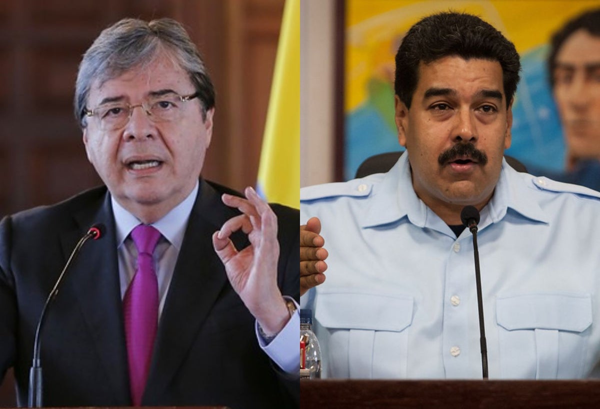 Carlos Holmes Trujillo y Nicolás Maduro