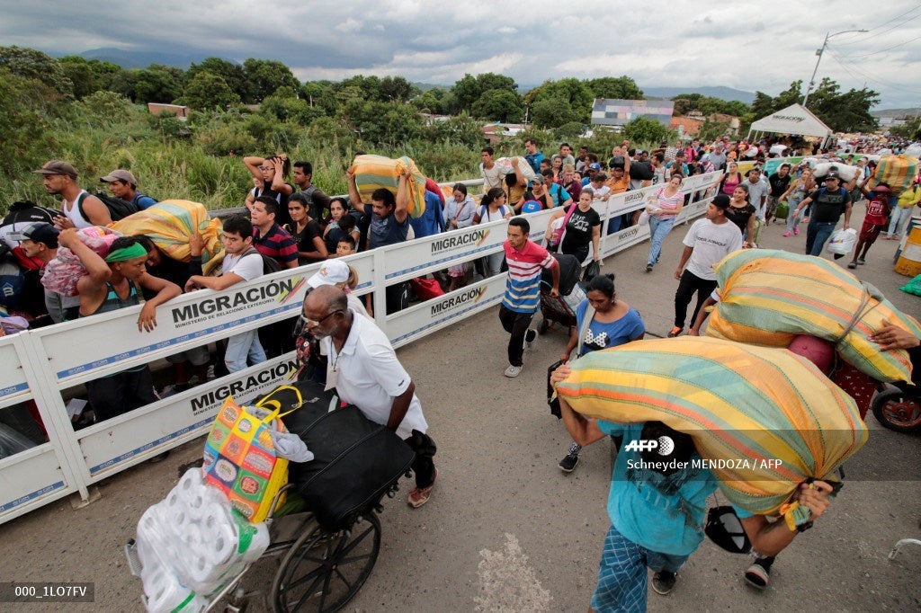 Migrantes venezolanos en el Puente Internacional Simón Bolívar
