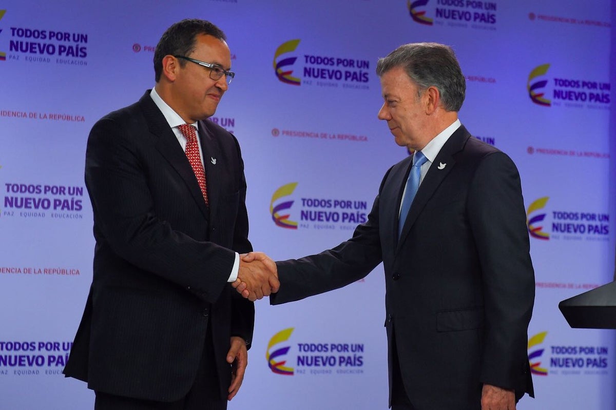 Alfonso Prada y Juan Manuel Santos