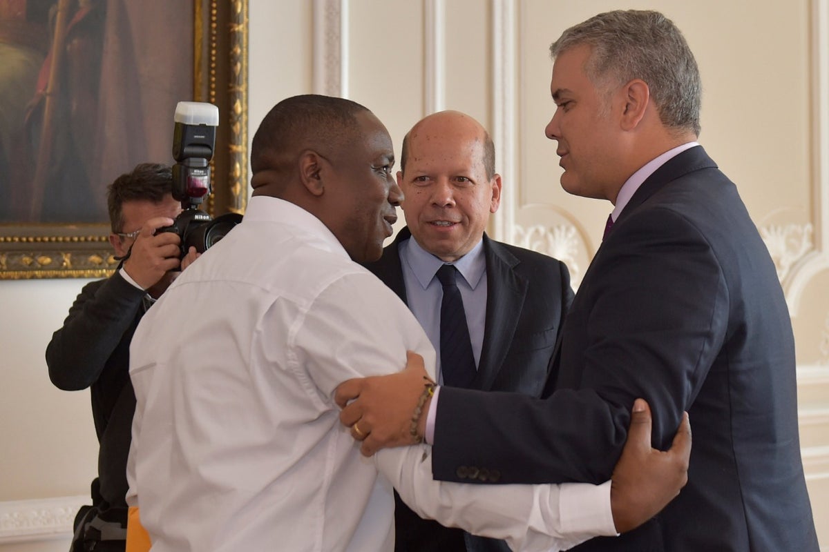 El líder social Leiner Palacios y el presidente Iván Duque