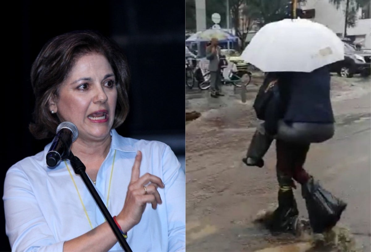 María del Rosario Guerra cruza un charco montada a tuta