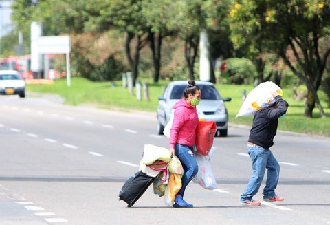 Venezolanos varados en Bogotá que piden regresar a su país.