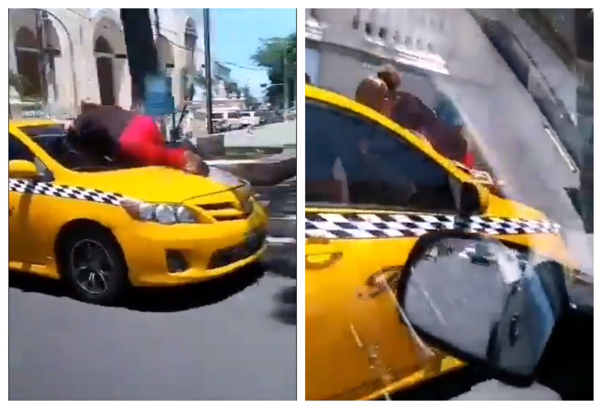 Mujer se lanzó al capó de taxi en El Salvador