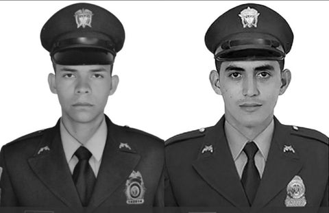 Los policías Jaime Luis Castaño Castillo y Carlos Enrique Calderón.