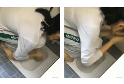 Entrenador chino obliga a niños a lavarse con agua del inodoro