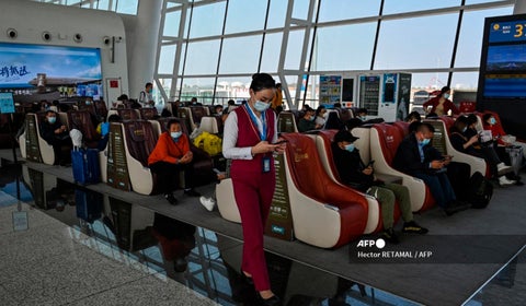 Viajeros en aeropuerto de China