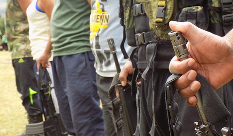 Reclutamiento de menores portando armas