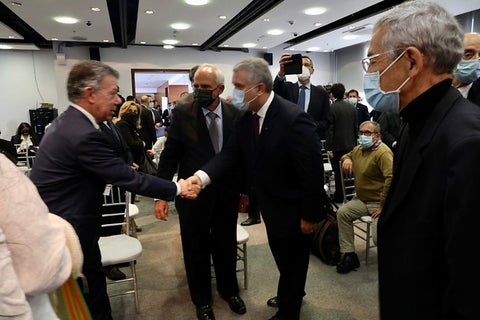 JUAN MANUEL SANTOS E IVÁN DUQUE