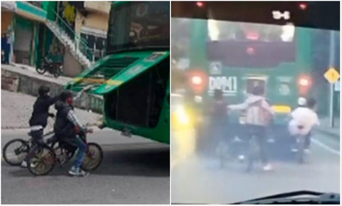Ciclistas colgados de buses del SITP