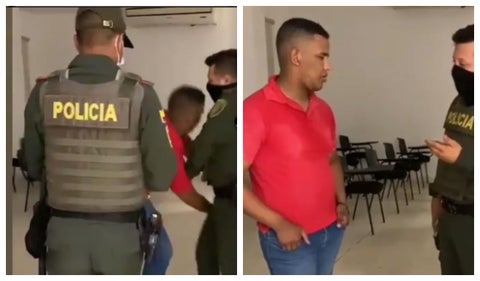 Policía que le quita el arma