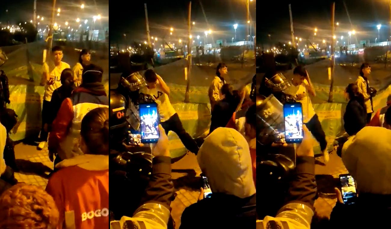 Madre reprende a su hijo por participar en enfrentamientos durante protestas