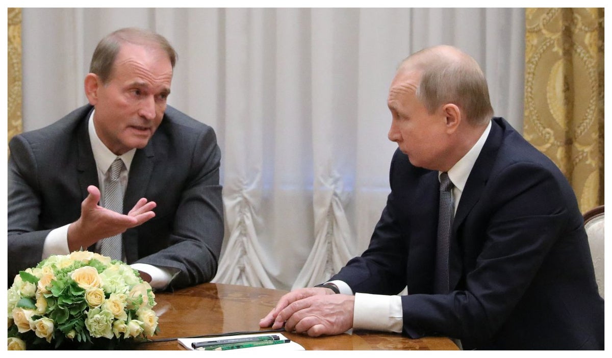 Víctor Medvedchuk y Putin