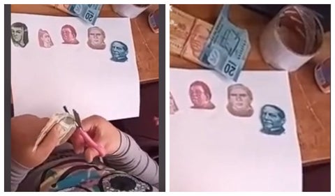 Niña cortando billetes
