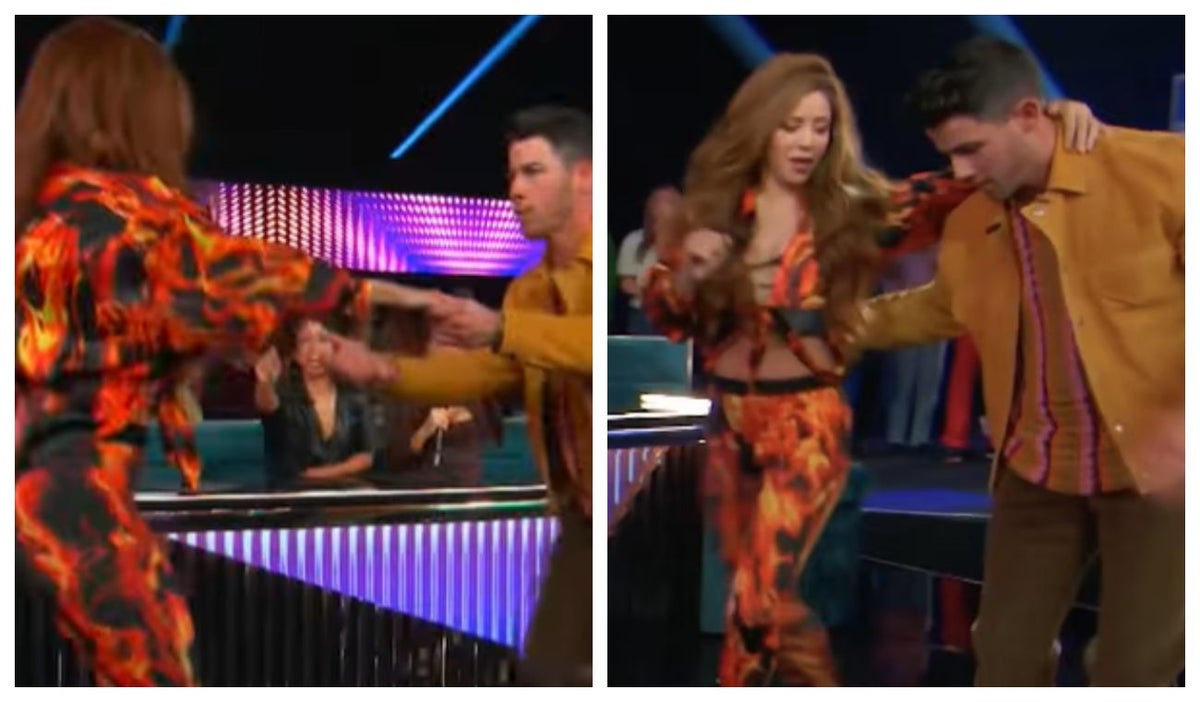 Shakira y Nick Jonas bailando
