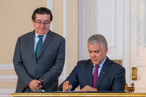 El presidente Iván Duque y el ministro de Salud, Fernando Ruiz