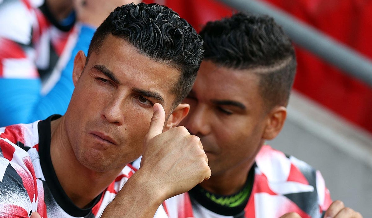 Cristiano Ronaldo en la banca con el Manchester United