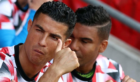 Cristiano Ronaldo en la banca con el Manchester United