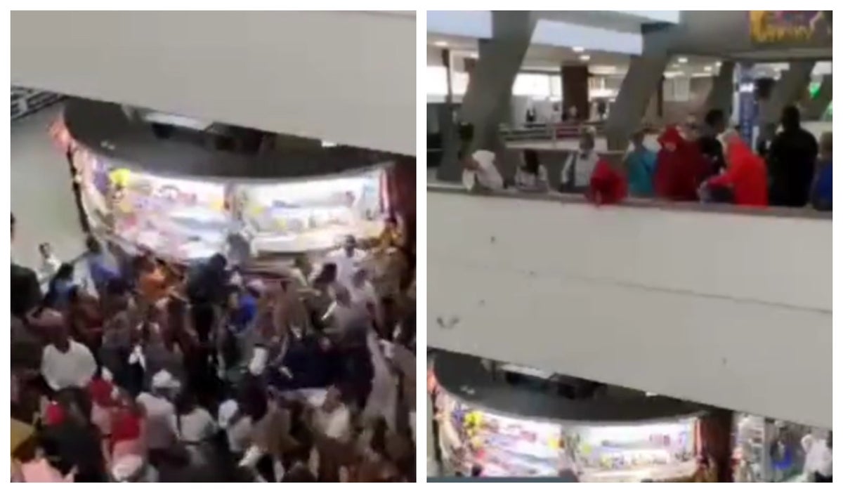 Disfrazados de 'La Casa de Papel' lanzando billetes en terminal de Cali