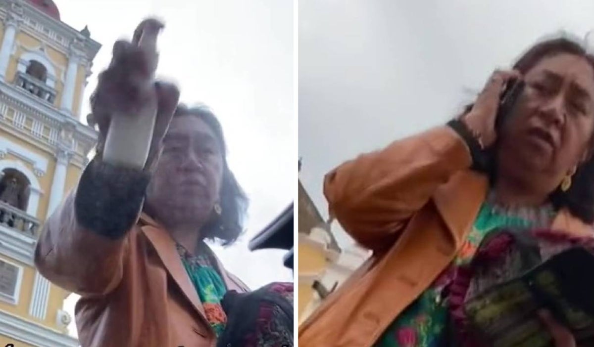 Mujer arroja agua bendita a pareja gay