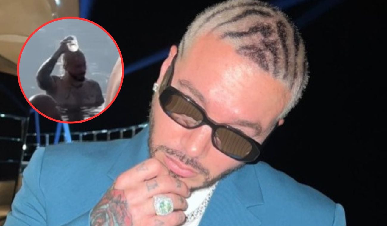 J Balvin se baña con un vaso en exclusivo resort