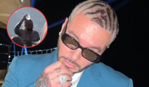 J Balvin se baña con un vaso en exclusivo resort
