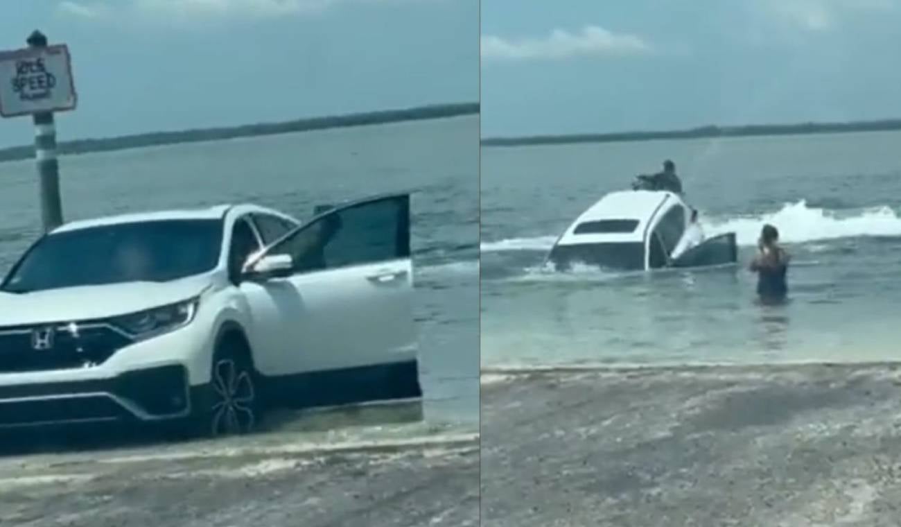 Mujer parqueó su camioneta en la playa
