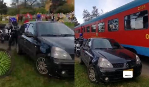 Tren de Bogotá casi destruye un carro que estaba mal parqueado