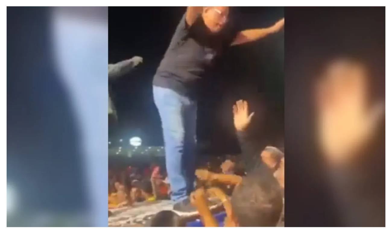 Alcalde demasiado emocionado se lanzó desde tarima, pero el público no lo cargó