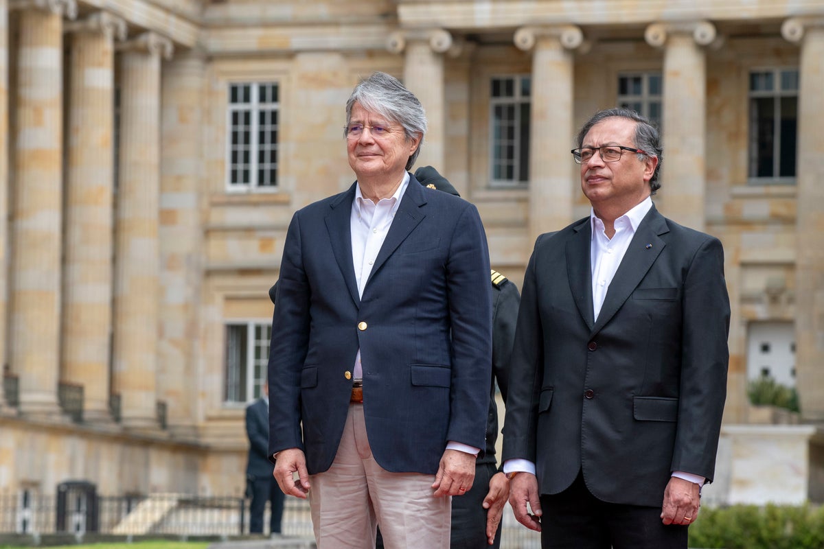 Guillermo Lasso y Gustavo Petro