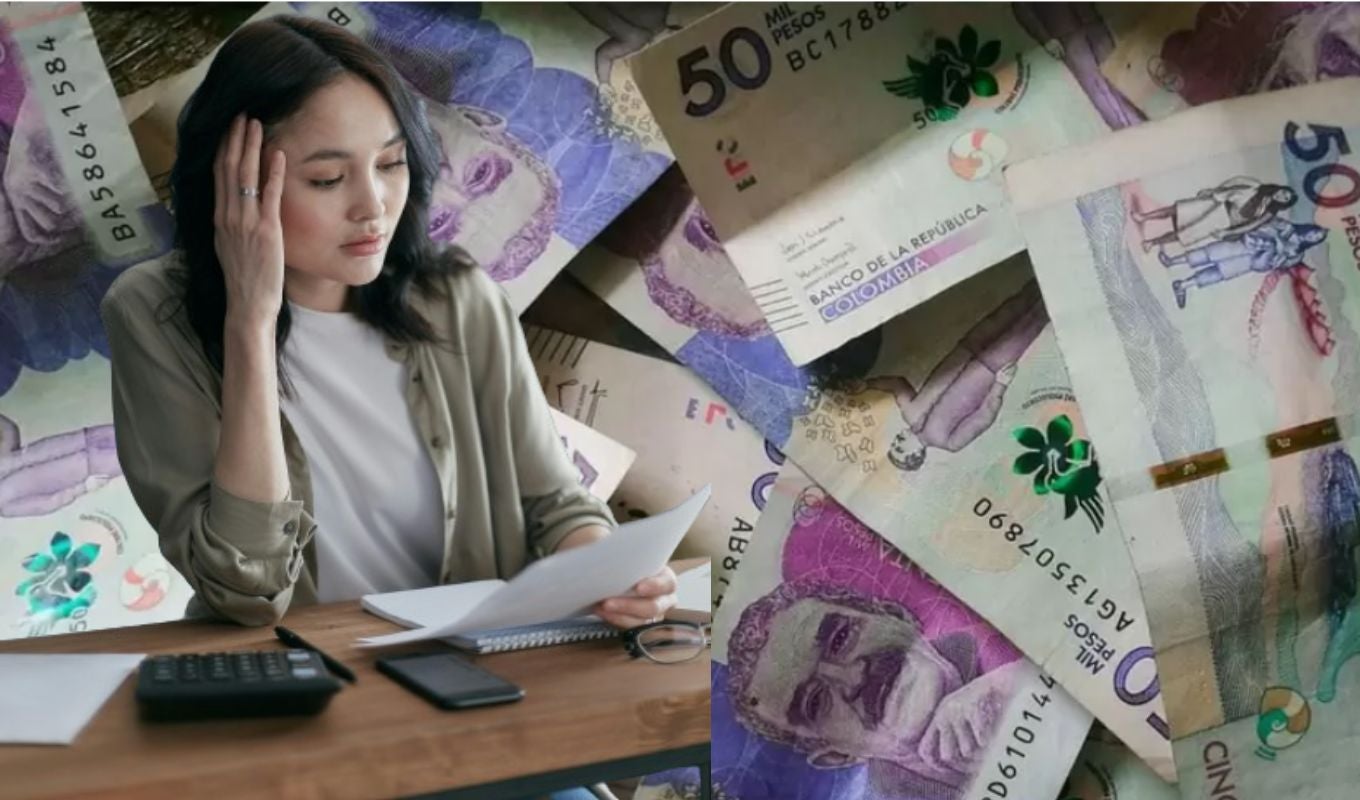 Billetes y mujer preocupada
