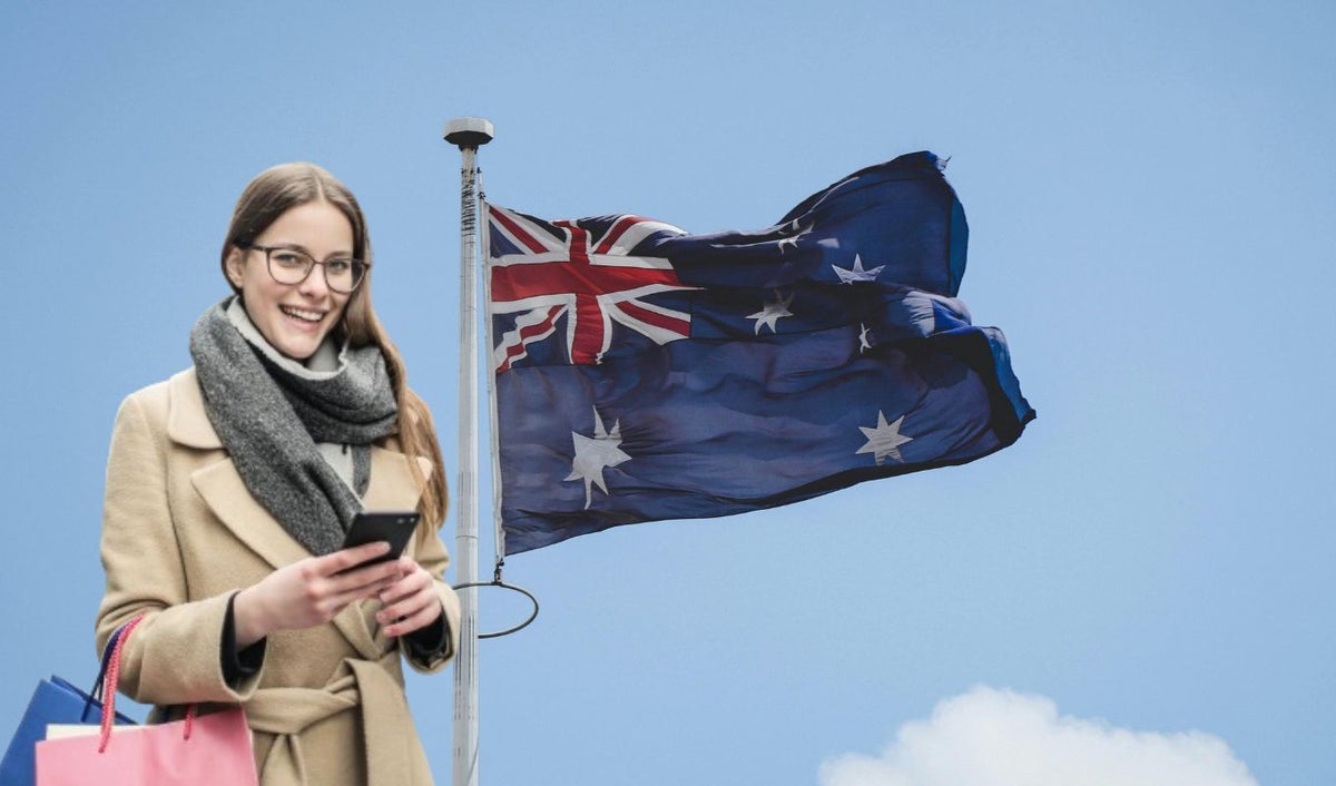 Bandera de Australia y una mujer
