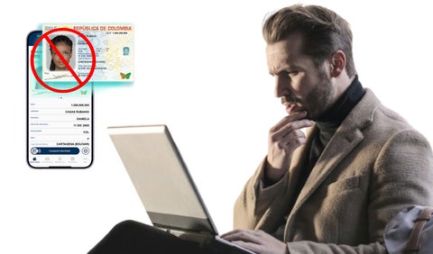 Hombre con computador y la cédula digital