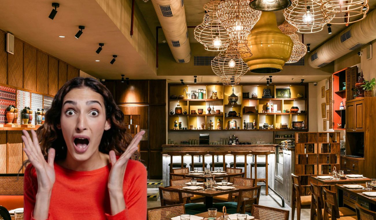 Restaurante y una mujer sorprendida