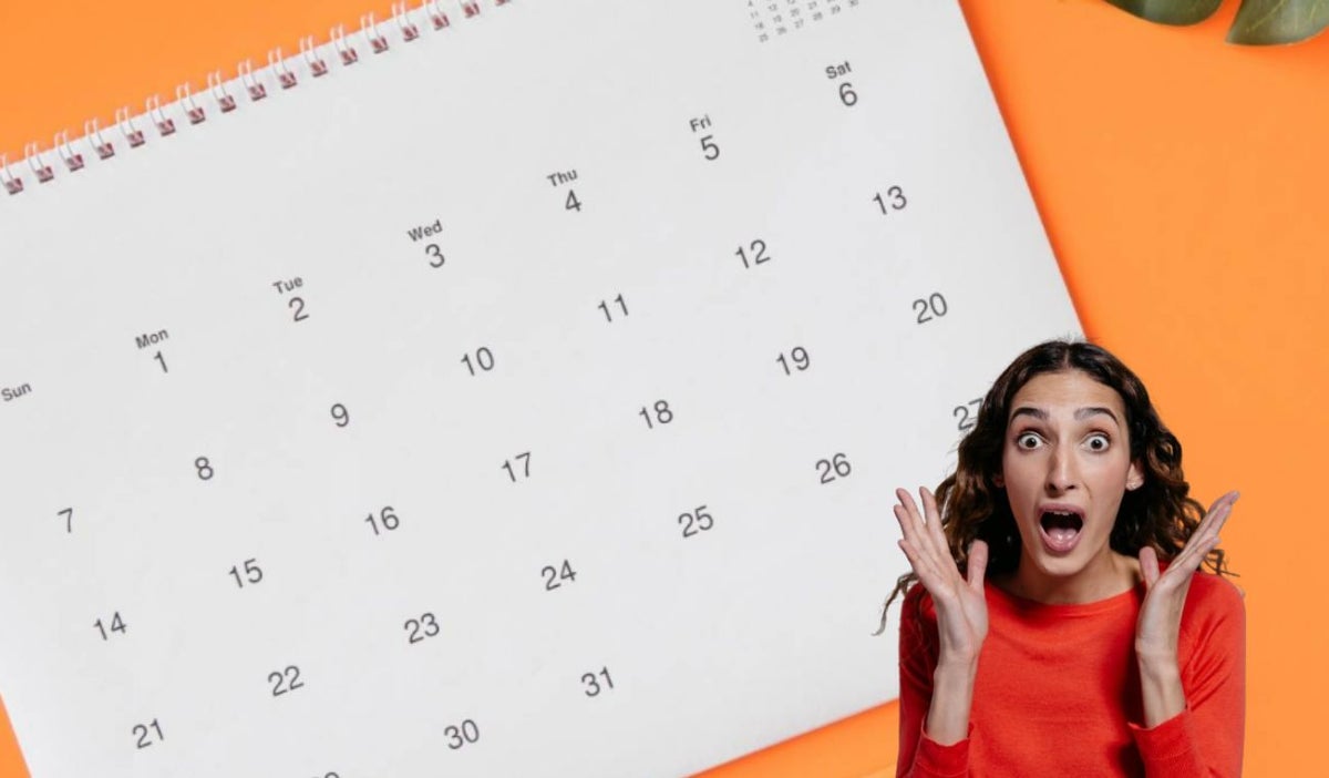 Calendario y una mujer sorprendida