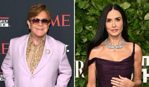 Elton John y Demi Moore